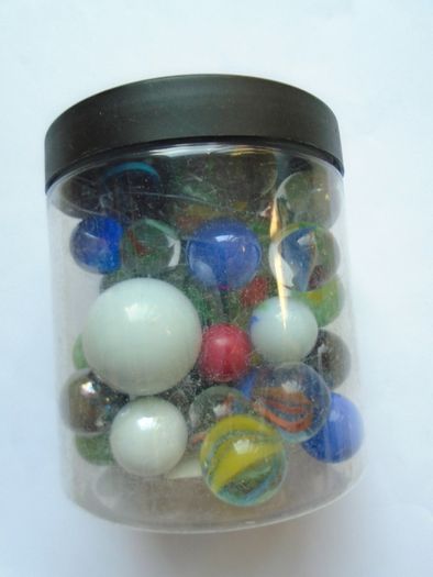 Jar of assorted marbles, Marbles.