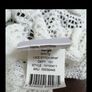 A. Wear white 100% cotton wrap over cardigan. Image 3