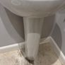 Bathroom sink, toilet, radiator Image 2