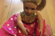 Doll in beautiful casual dress with sequins
