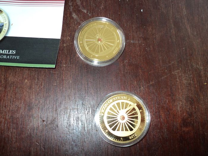 4 Flying Scotsman commemorative coins .