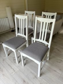 Four kitchen chairs.