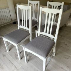 Four kitchen chairs.