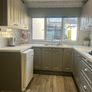 grey shaker Kitchen Units, white spec worktops, gas hob with glass extractor and FRANKE sink included. Image 4