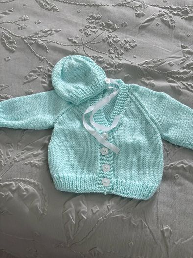 hand knitted baby blankets and cardigans