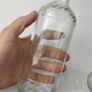 328 - Set of 2 Vintage Clear Glass Collectible Decorative Swirls Bottles Image 2