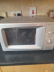 Silver microwave Dawoo brand perfect working condition