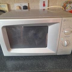 Silver microwave Dawoo brand perfect working condition