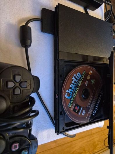 Play Station 2 super slim + DualShock 2 + Charlie game