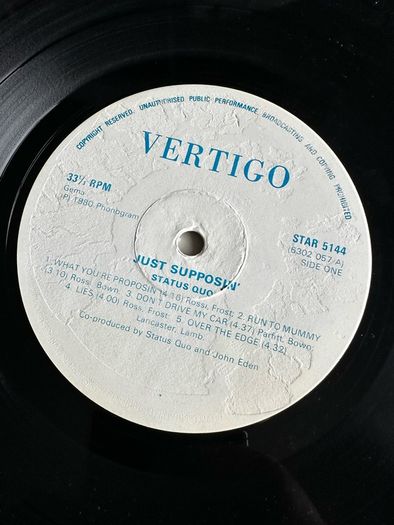 Status Quo. Just Supposin original Zimbabwe release. vinyl vg+ sleeve has a bit of damage and is tatty. See pictures
