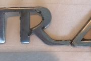 Original Triumph TR4 metal car badge from 1961 to 1965