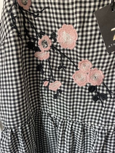 top Bnwt black & white peplum top size 12
