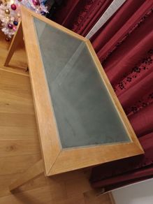 Wooden dinning table with glass.