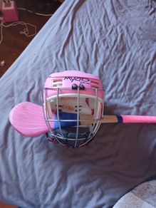 girls hurley and helmet