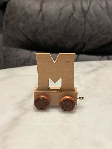 Letters, toys. Name Mia