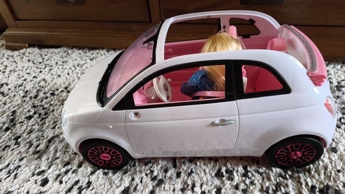 Barbie with car.