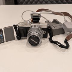 Olympus PEN Lite E-PL7 with 14-42mm lens and accessories