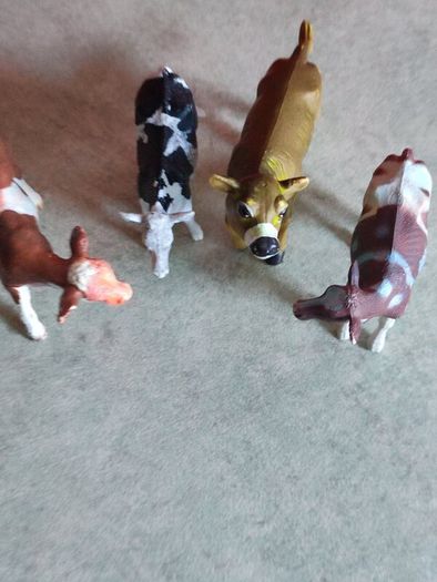 Collection of 4 COWS animal Farm toys .