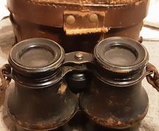 vintage binoculars and case