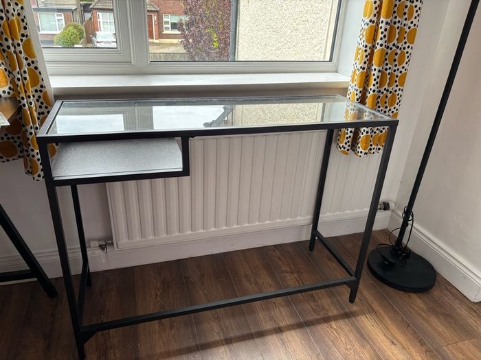 Glass console table with shelf
