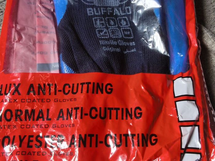 a selection of new in the bag work gloves