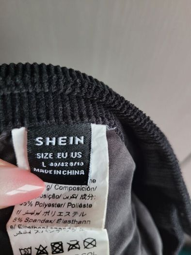black corduroy trousers