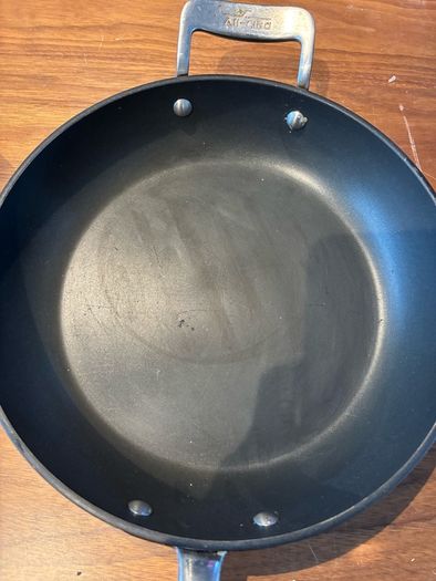 Set of All Clad pots and pans