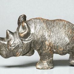 Small heavy rhino figurine
