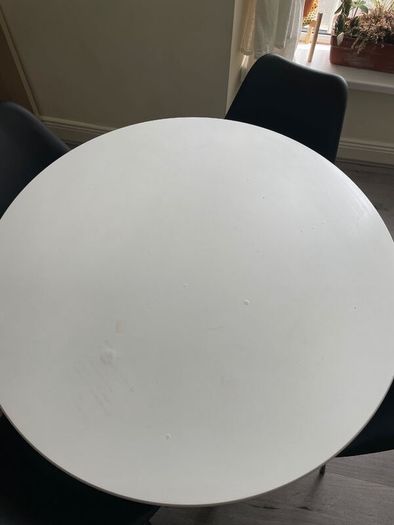 Round White Dining Table + Modern Chairs