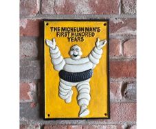 Michelin Man  100 Years  Yellow  Cast Iron  HS246