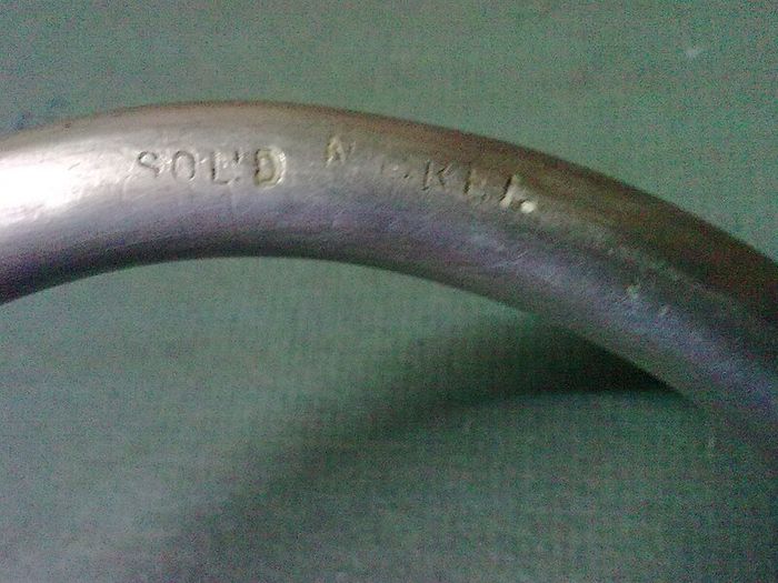 Large old nickel horse bit.