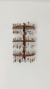 Souvenir spoons on 3-tier wall-mounted souvenir spoon display rack   36spoons