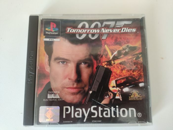 Playstation 1 console SCPH-7502 with games and cords