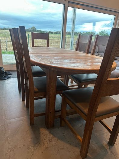 solid oak table and 6 chairs