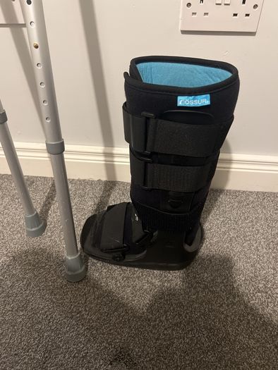 Pair of crutches and orthopedic boot