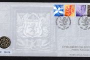 1999 Scotland A Parliament for Scotland Philatelic Numismatic Cover (PNC) with set of definitive set and UK1 coin