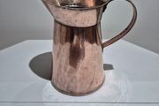Vintage rolled copper jug