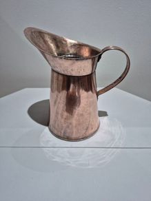 Vintage rolled copper jug