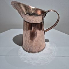 Vintage rolled copper jug