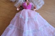 Vintage Barbie with blond hair and princess dress