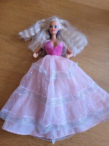 Vintage Barbie with blond hair and princess dress