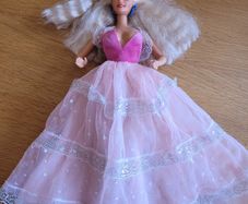 Vintage Barbie with blond hair and princess dress