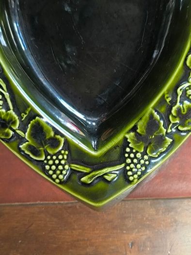 vintage Moet & Chandon shield-shaped ceramic advertising piece.