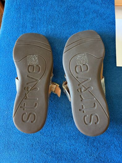 Strive Women's sandals size 6UK.  Gold. As New with box.