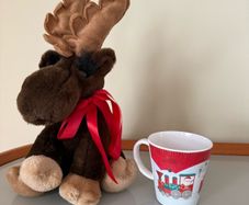 Festive moose soft toy and Santa Express Children's Christmas cup