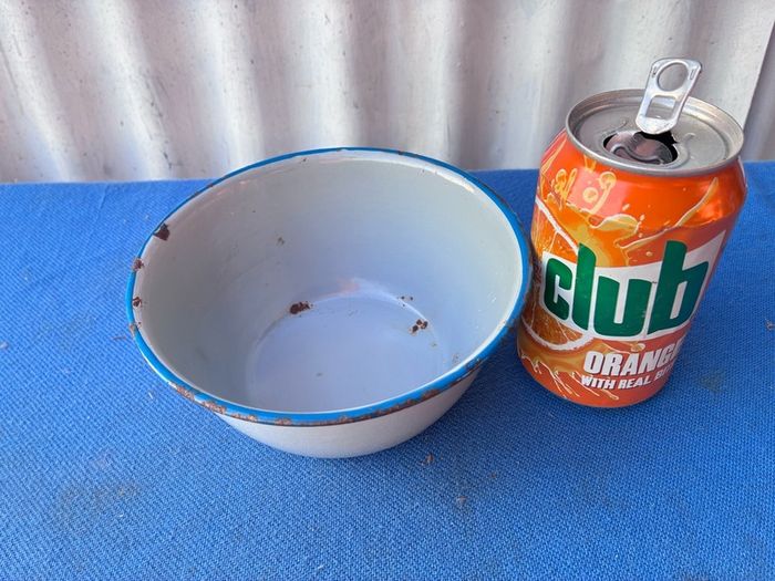 Vintage grey enamel dish with blue rim