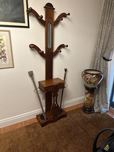 antique hall stand in good condition, very neat and a glove compartment in centre,