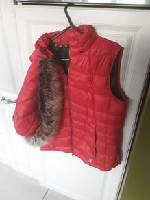 ladies red sleeveless Barbour jacket with detachable fur hood
