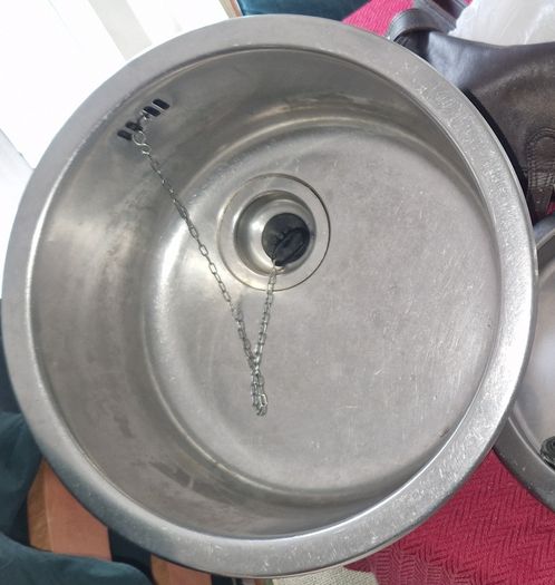 Round sink and tap
