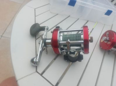 A pair of abu garcia ambassador 7000i